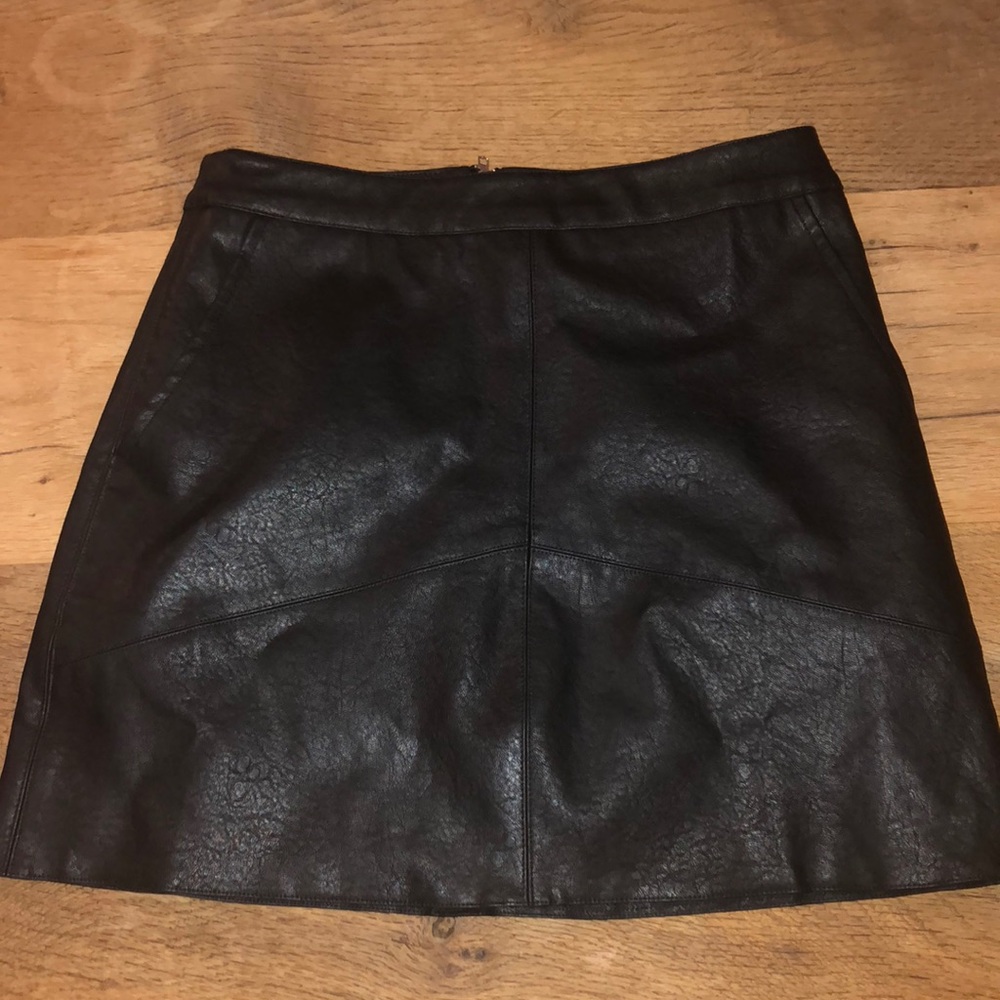 Black leather mini skirt
